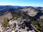 Tsum Peak summit view. My sons are above the rocks near center.