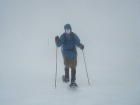 Nearing the summit in the fog and wind.