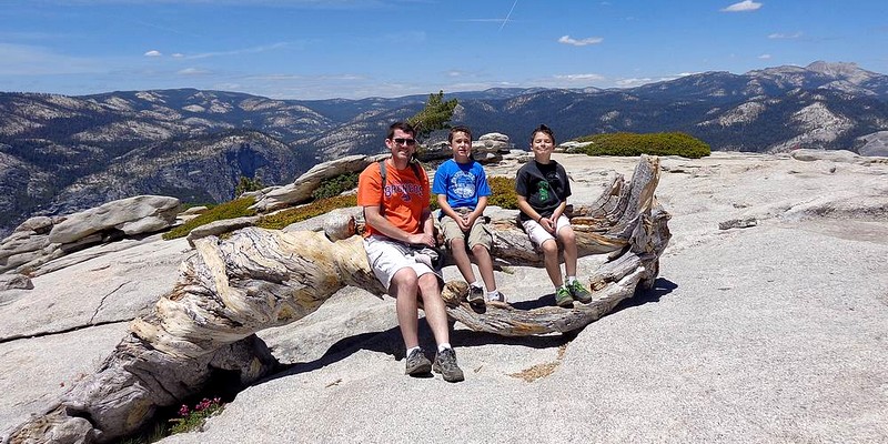 Sentinel Dome summit, posing on the famous Jeffrey Pine