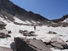 Crossing snowfields as we drop into the Flytrip Basin.