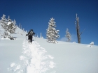 Heading up through the powder early in the climb.