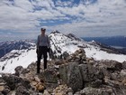 Michael on the summit of Little Elk Peak, Mount Baird in the background.