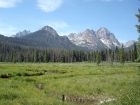 View from the Fishhook Creek trail, Mount Heyburn on the far left, Horstmann Peak on the right, and Mount Ebert on the far right.