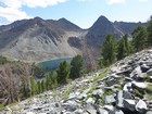 Climbing toward Tendoy Peak, Bear Valley Lake and Lem Peak in the background.