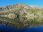 Morning reflection of Peak 9125' (Baldy Ridge #3) in Buck Lake.