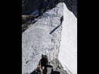 Careful descent down to the snow bridge.