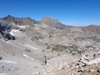 Looking back at the talus we climbed with Devil's Bedstead in the background.