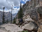 Graceful boulder hopping, with Elephant's Perch in the background.