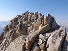 The summit of Brocky Peak comes into view.