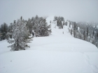 Heading up the ridge into the fog.