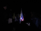 Huddled around Old Glory on the summit.