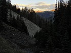 Almost back to the trailhead, with some alpenglow in the distance.