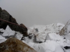 Sean making the first rappel from the summit ridge.