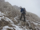 Dave rappelling down the east face. SeanD photo.