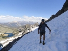 Sean crossing the snowfield at the base of Clyde Minaret.