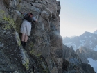 Dave downclimbing a steep section just below the summit ridge. (SeanD photo.)