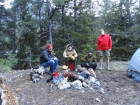 Lively group around the cold fire ring.