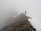 Descending the summit ridge.