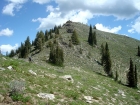 John climbing towards Pk 7859'.