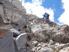 Steep but stable chimney to the summit.