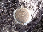 Survey marker on the summit.