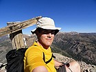 Me trying to duplicate Tom's photo on the north summit with the signpost.