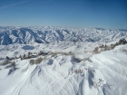 Looking west across the wrinkly Danskins. The ridge in the distance goes from Three Point Mountain to Kepros Peak.