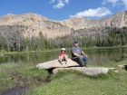 Sitting on the rock with Grandpa.