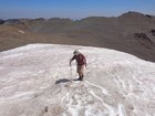 Checking out bear tracks in the snow.