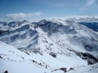 The view southeast from the summit at the big peaks on the Boulder front.