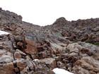 Steep scramble section near the summit.