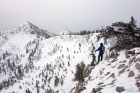 Dave looking south from the named summit, toward the highpoint. ErikP photo.