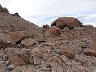 Passing through some volcanic boulders on the way down.