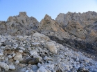 View of The Needle from just above the lower saddle. OS Couloir to the left, Upper Exum Ridge to the right.