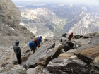 Climbers roping up at the base of the Owen Spalding route.