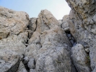 Looking up Sargent's Chimney. There is a climber on the left, and another preparing to rappel on the right.