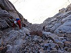 Making our way up the loose rock in the gully.