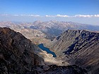 The view north from the summit of Granite Peak includes Mt Hague, Mt Wood, Avalanche Lake, and Freeze To Death Plateau (far right).