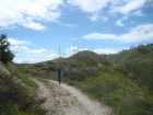 Hiking along the road, nearing the saddle.