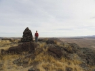 Posing by the summit cairn.