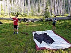 Setting up the tent.