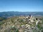 The view across the summit cairn with Shaffer Butte and Mores Mountain in the background.