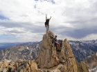 Hero shot of Chris on the summit.