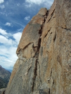 Dave nearing the end of the rappel. ChrisR photo.