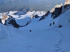 Leaving the couloir, big snowfield below.