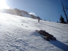 John angling across the snowfield.