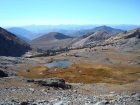 The view down on the upper lake during the descent. You can see the climbers trail off to the right.