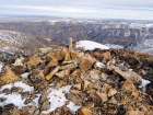 Summit cairn on Jumbo Peak, Jarbidge Wilderness in the background.