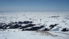The Camas Prairie southwest from the summit, still covered in snow.