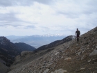 Sean on the trail to Leatherman Pass with the White Knob Mountains in the background.